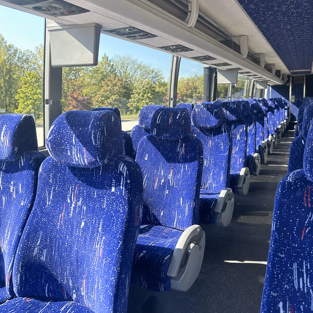 long distance charter buses for road games and away game fan trips from hamilton